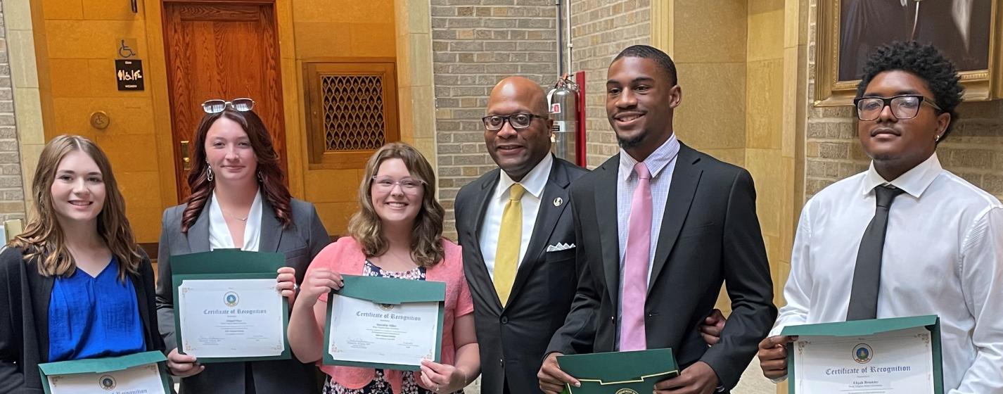 People getting Certificates of Recognition
