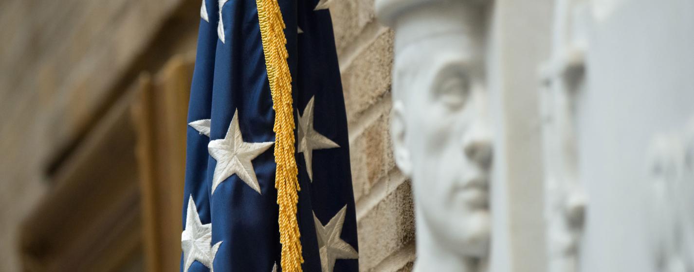Image showing a US flag near a wall