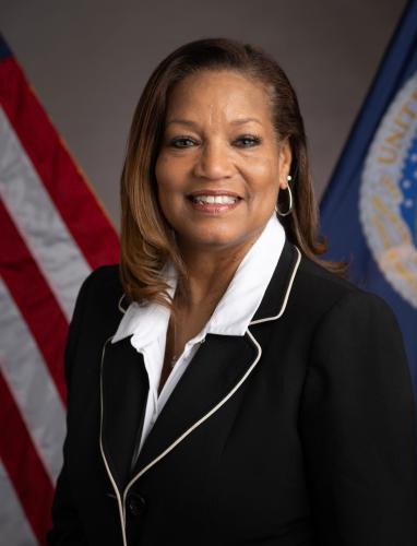 Michelle E. Warren, Acting Director of Office of Small and Disadvantaged Business Utilization