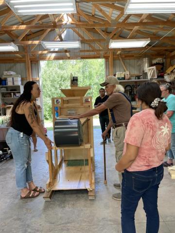 People talking about a fanning mill