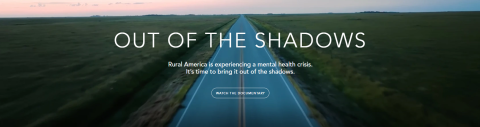 Graphic showing Out of the Shadows text overlay on a road