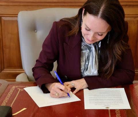 Secretary Rollins signing a proclamation