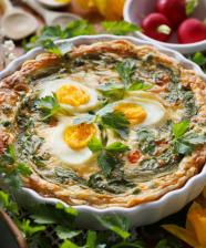 Image showing three eggs in a quiche surrounded by flowers