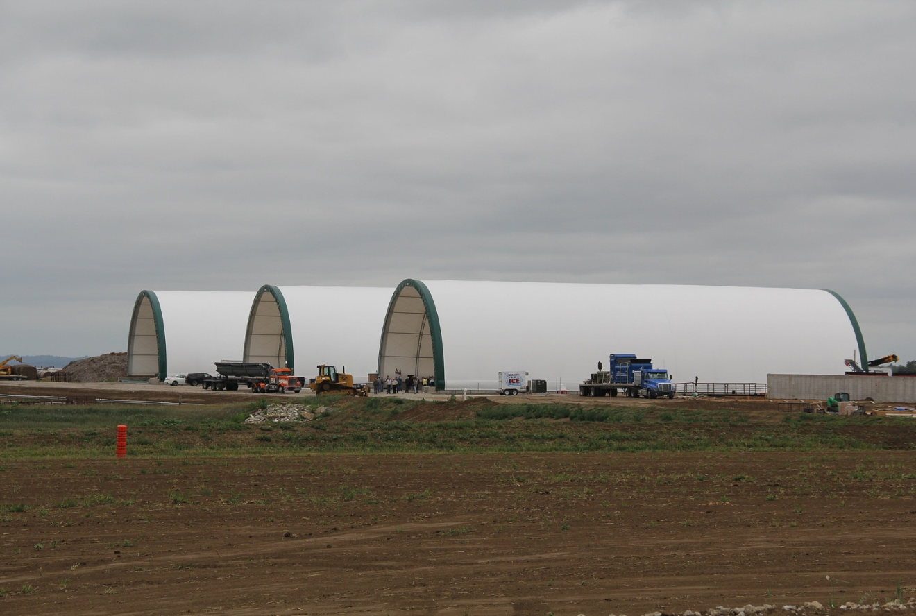 Three hoop buildings at a fertilizer facility