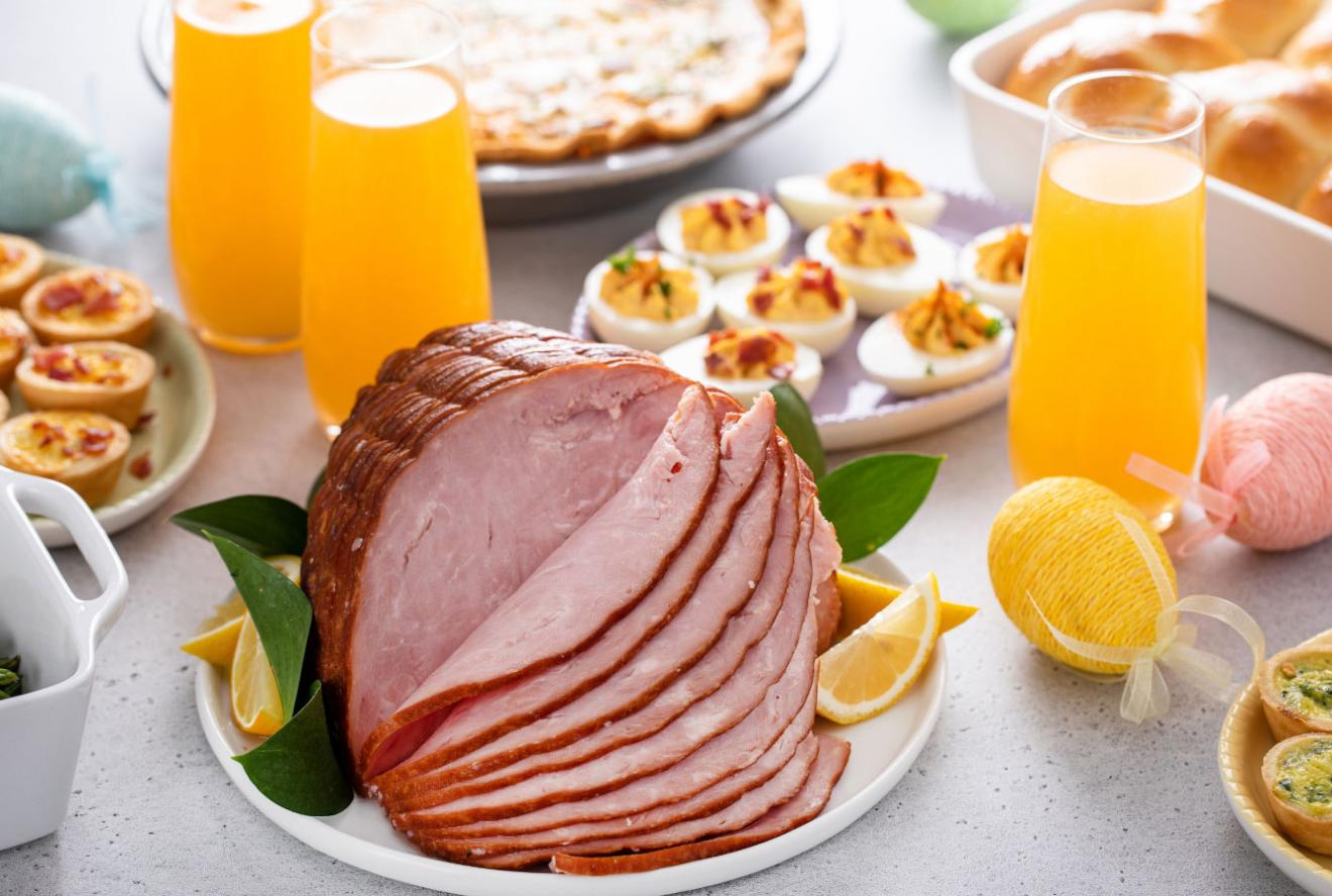 Assortment of sliced ham, eggs and Easter meals