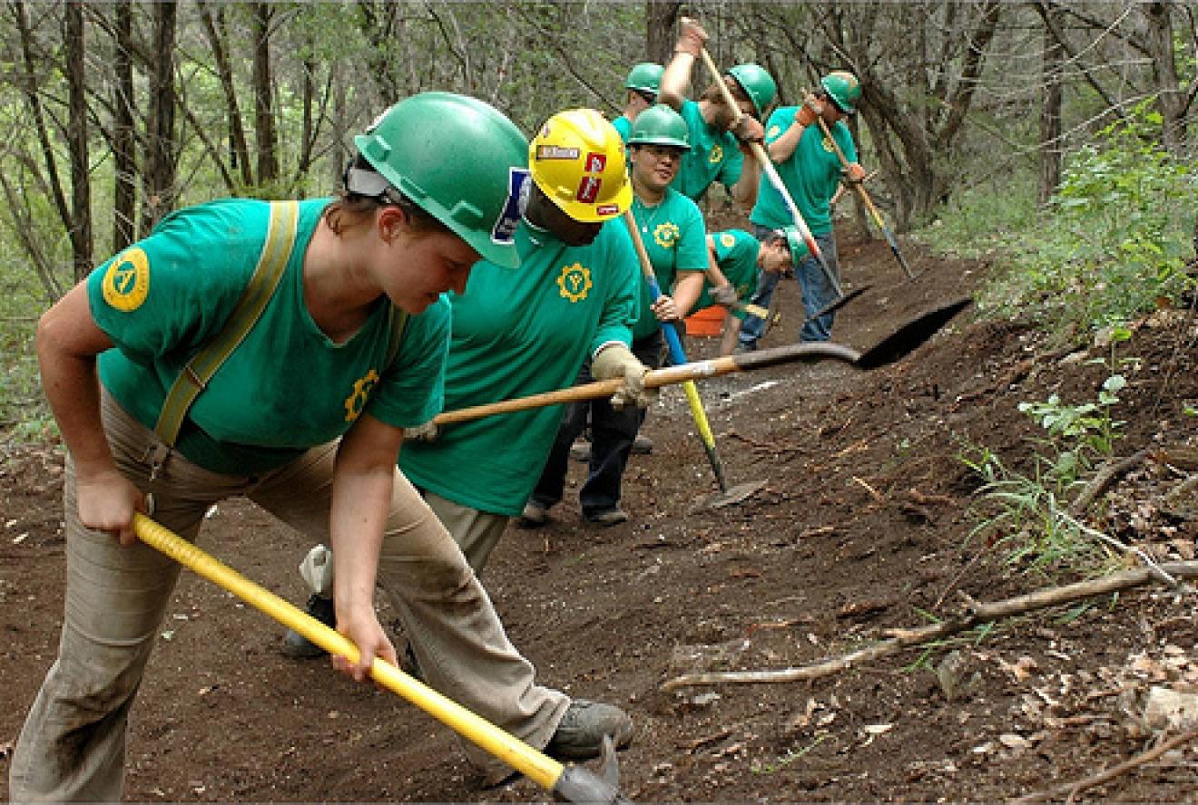 Texas Conservation Corps members building new trail in Texas in partnership with Texas Parks and Wildlife.  Texas Conservation Corps is an AmeriCorps service program of American YouthWorks, a nationally recognized nonprofit and charter high school headquartered in Austin, Texas.  Each year the program engages over 100 diverse youth and college-aged young adults  in critical, hands-on conservation and disaster service projects, giving participants the skills and opportunities to solve real life community and